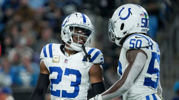 Indianapolis Colts cornerback Kenny Moore II (23) talks with Indianapolis Colts linebacker Segun Olubi (50) between plays Sunday, Nov. 5, 2023, during a game against the Carolina Panthers at Bank of America Stadium in Charlotte.